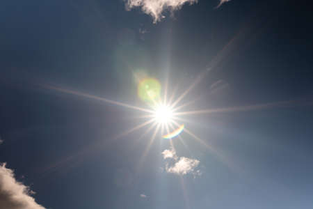 Beautiful sky with volumetric clouds, and the rays of the sun. For any purposeの写真素材