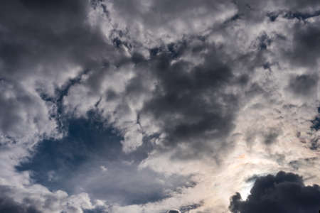Beautiful sky with volumetric clouds, and the rays of the sun. For any purposeの写真素材