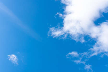 Beautiful sky with volumetric clouds, and the rays of the sun. For any purposeの写真素材