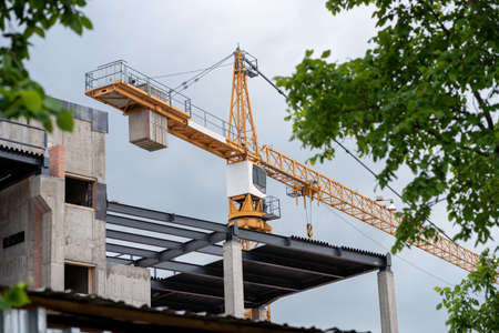 crane in the city in cloudy weather.