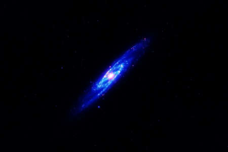 Small galaxy on a dark background.