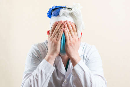 The doctor has gone mad from work. High quality photoの写真素材