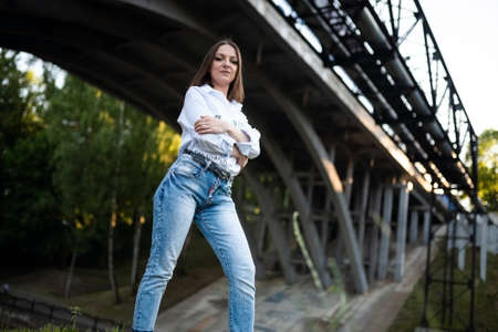 Beautiful girl with a paper bag with groceries.の写真素材