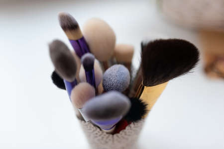 Makeup brushes, different sizes, in a glass. high quality photoの写真素材