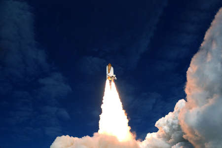 Launch of a space shuttle into space.の写真素材