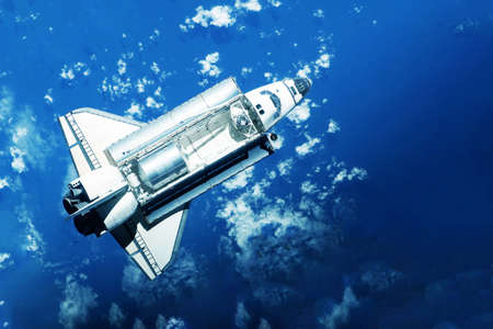 Space shuttle over the planet.