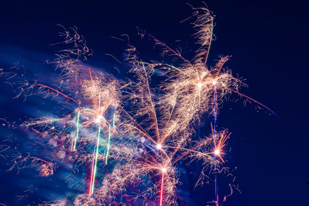 Bright, beautiful blue fireworks in the night sky. high quality photoの写真素材