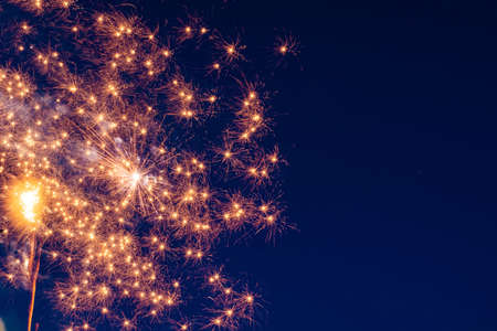 Bright, fiery fireworks against the background of the night sky. high quality photo