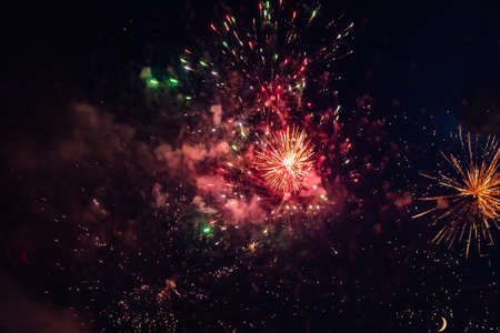 Beautiful multi-colored fireworks against the background of the night sky. high quality photoの写真素材