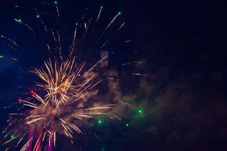 Inexpensive, budget, beautiful fireworks in the city, against the backdrop of the night sky. high quality photoの写真素材