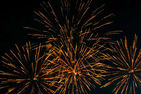 Bright, fiery fireworks against the background of the night sky. high quality photoの写真素材