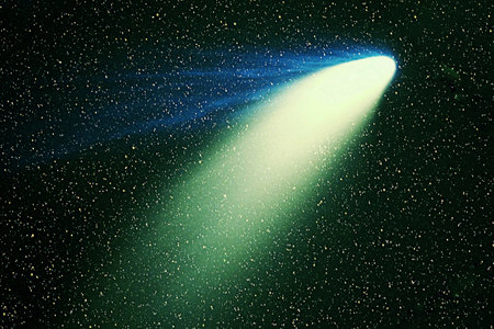 Green comet in dark space.