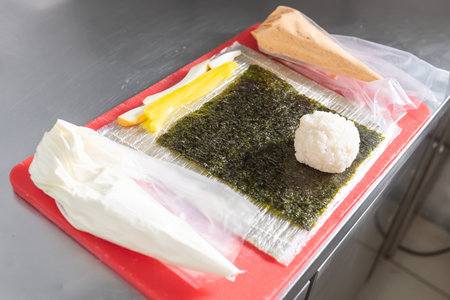 Ingredients for making sushi with cheese, daikon and smoked squid. high quality photoの写真素材