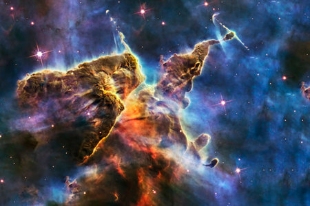 A cosmic nebula formation captured in vivid colors. Elements of this image furnished by NASA. High...