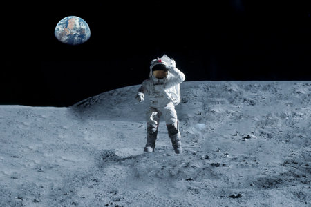 Astronaut is walking on the moon. With land on the horizon. High quality photo