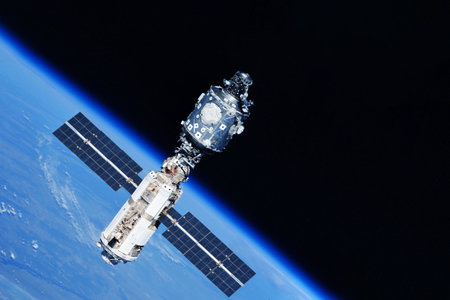 A space satellite above the Earth's surface. High quality photo