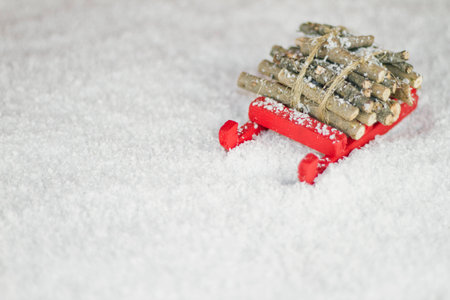 Red sleigh on the snowの写真素材