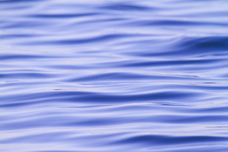 Blue tinted sea waves background