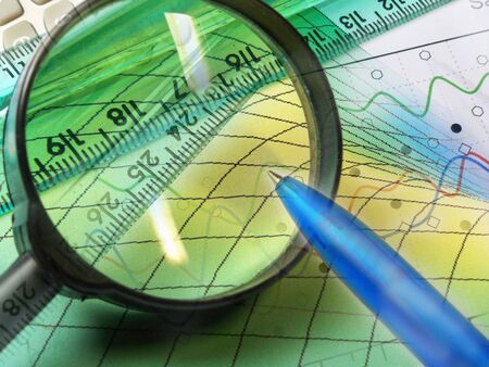 Graphic, magnifier, ruler and calculator, collage about analysis.の写真素材