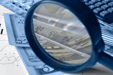Business background with graph, ruler, money and calculator.の写真素材