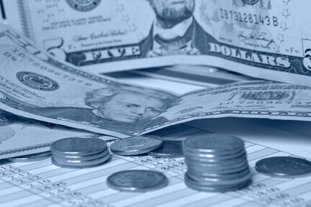 Business background in blues with money and table.の写真素材