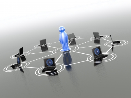 Network - man and laptops on grey background.の写真素材