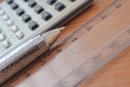 Business background with graph, ruler, pen and calculator.の写真素材
