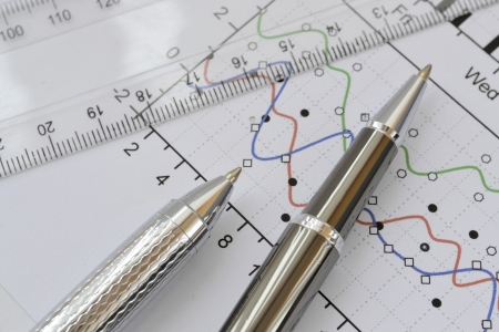 Business background with graph, ruler and pen.の写真素材