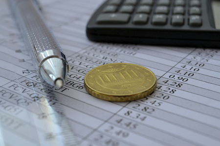 Business background with money, calculator and pen.の写真素材