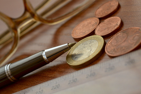 Financial background with money, calculator, table and pen.の写真素材