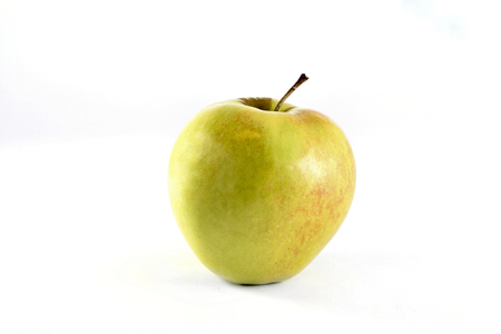 Green and red apple on the white background.の写真素材