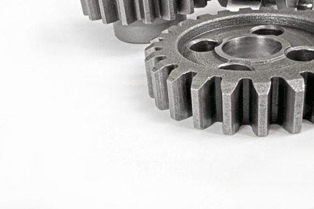 Three metal gears on the white background.の写真素材