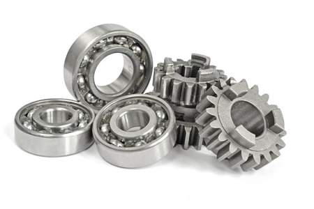 Gears and bearings on the white background.の写真素材
