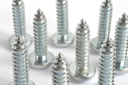 Set of screws on the white background.