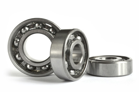 Three close-up bearings on the white background.の写真素材