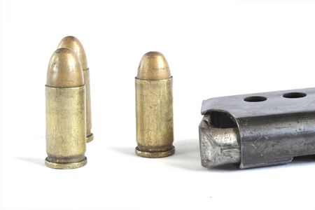Clip and ammunition on the white background.