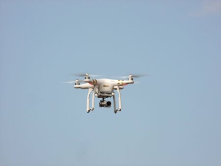 The drone flying in the sky