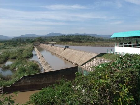 Water flowing in the damの写真素材