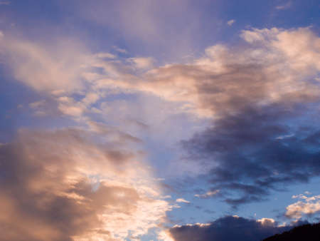 Dramatic sky with clouds at sunset.
