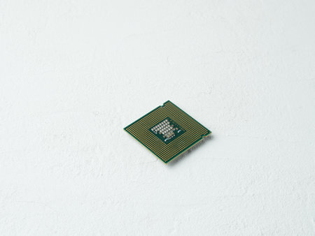 Central processor on white background. Close up cpu studio shot. Computer's component.の写真素材