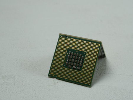 Central processor on white background. Close up cpu studio shot. Computer's component.