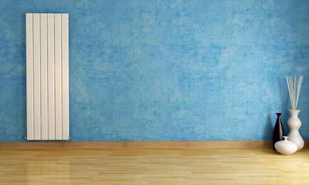 Blue empty room with  vertical hot water radiator - rendering の写真素材