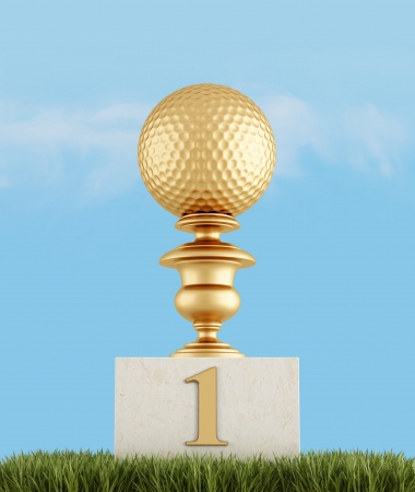 golden golf trophy on the podiumの写真素材
