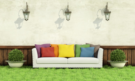 Garden with classic sofa with colorful cushion  on grass  3D Renderingの写真素材