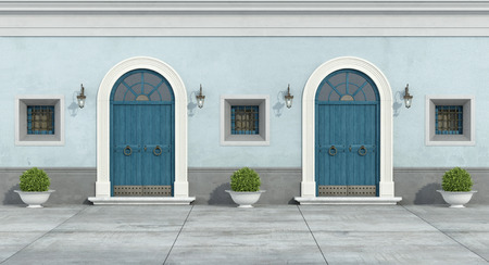 Blue old facade with two wooden doorway and little windows - 3D Renderingの写真素材