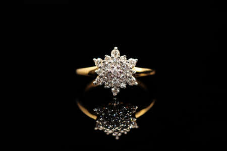 Diamond ring on a reflective surface