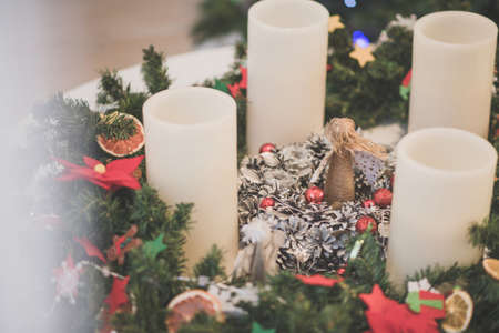 Christmas cake with advent wreath and angel