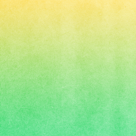abstract green yellow textured paper backgroundの写真素材
