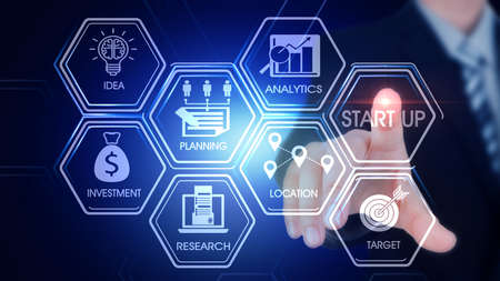 StartUp Hexagonal Touch Screen Concept Hexagonal virtual Touch Screen Concept with  man touching screen with finger and light streakの写真素材