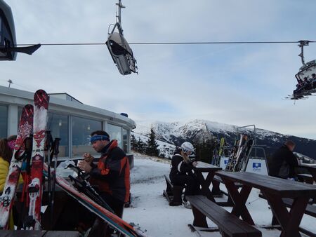 JASNA, SLOVAKIA - JANUARY 10, 2014. Ski resort and people.のeditorial素材